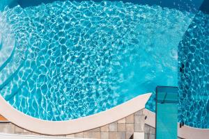 Bazén v ubytovaní Luxury Apartments VilaMaloca alebo v jeho blízkosti