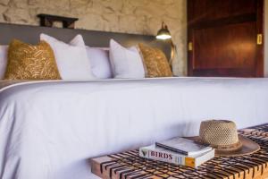 Postelja oz. postelje v sobi nastanitve Leopard Mountain Safari Lodge