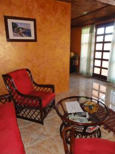 a living room with a couch and a coffee table at Rooms Marko Polo in Zadar
