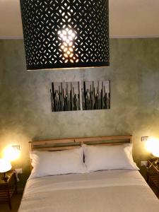 Postel nebo postele na pokoji v ubytování B&B Red Village