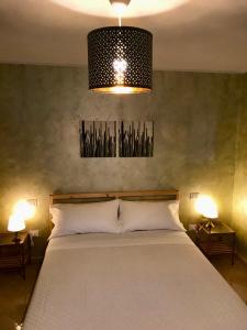 Postel nebo postele na pokoji v ubytování B&B Red Village