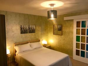 Postel nebo postele na pokoji v ubytování B&B Red Village