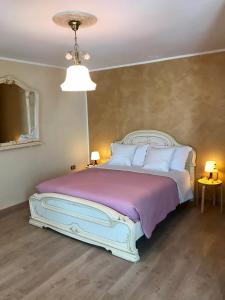 Postel nebo postele na pokoji v ubytování B&B Red Village