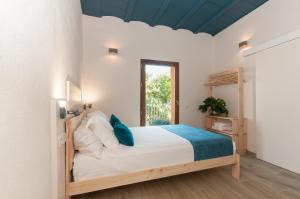 Postel nebo postele na pokoji v ubytování ecoGrusApartments