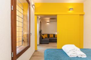Postel nebo postele na pokoji v ubytování ecoGrusApartments