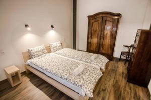 Posteľ alebo postele v izbe v ubytovaní Sewa Apartments