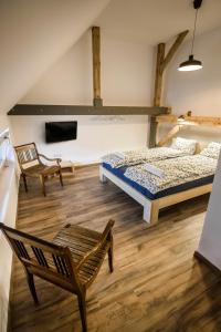 Posteľ alebo postele v izbe v ubytovaní Sewa Apartments