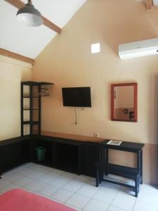 TV o dispositivi per l'intrattenimento presso La Casa Homestay