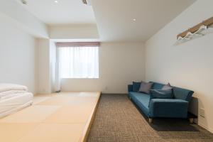Katil atau katil-katil dalam bilik di Imu Hotel Kyoto