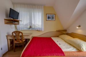 Krevet ili kreveti u jedinici u objektu Rooms & Apartments Jana