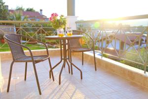 A balcony or terrace at Paliouri Villa Vista al Mar by Luxlikehome