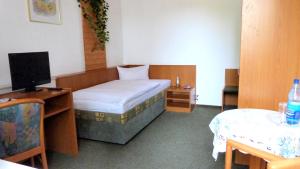 Postel nebo postele na pokoji v ubytování Hotel Mühlenhof