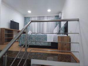 Postel nebo postele na pokoji v ubytování Dzveli Batumi + 37 fotografií