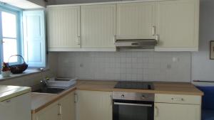 Kuchyň nebo kuchyňský kout v ubytování Neoclassical apartment, Central Chora Andros
