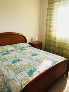 A bed or beds in a room at B&B Tra gli ulivi