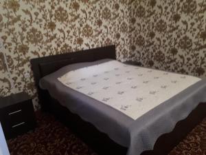 Hotel SUGD & Guest House客房内的一张或多张床位