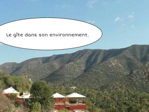 a sign that says le citeds son equipmentement on a mountain at Gîte Village Paradise Valley in Tagherat Anekrim