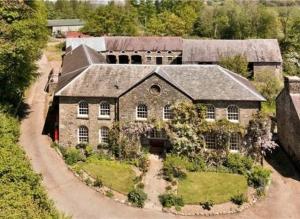 an aerial view of a large house with a garden at Henllys Estate B and B in Llandovery