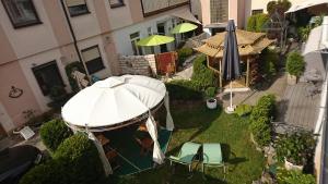 an aerial view of a garden with a gazebo at ApartmentHotel Vollumen in Redwitz an der Rodach