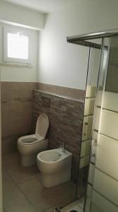 Koupelna v ubytování B&B rizziettu + 6 fotografií