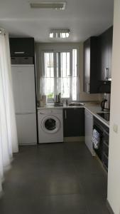 A kitchen or kitchenette at Urb. Valle Romano Capitolio 11B-C