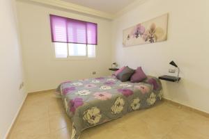 Posteľ alebo postele v izbe v ubytovaní Apartamento en Residencial cary 2.