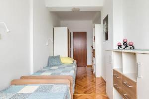 Postel nebo postele na pokoji v ubytování Apartment-center of Split
