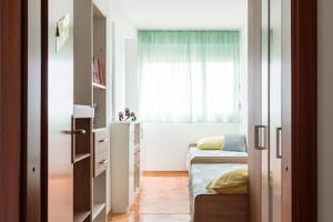 Postel nebo postele na pokoji v ubytování Apartment-center of Split