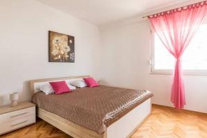 Postel nebo postele na pokoji v ubytování Apartment-center of Split