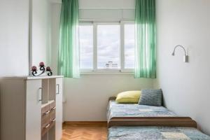 Postel nebo postele na pokoji v ubytování Apartment-center of Split