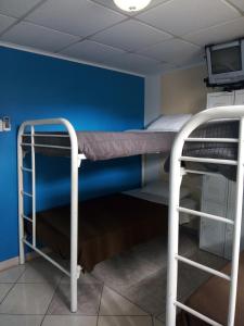 Postel nebo postele na pokoji v ubytování Hostel Room Aruba