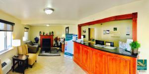 a lobby with a counter and a waiting room at Quality Inn Price Gateway to Moab National Parks in Price