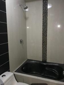 Koupelna v ubytování Hotel Manantial No,002