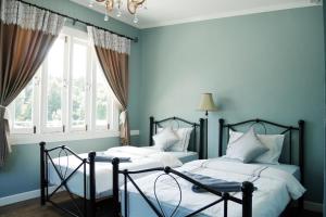 Katil atau katil-katil dalam bilik di Sky cottage