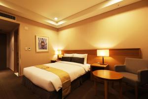 Postel nebo postele na pokoji v ubytování Bridge Hotel Incheon Songdo