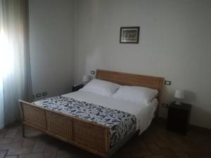 Ліжко або ліжка в номері Villa Giulia