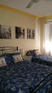 En eller flere senger på et rom på Lavender House Bed & Breakfast