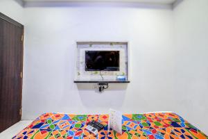 Postel nebo postele na pokoji v ubytování FabHotel ABC View