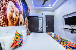 Postel nebo postele na pokoji v ubytování FabHotel ABC View