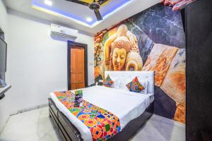 Postel nebo postele na pokoji v ubytování FabHotel ABC View