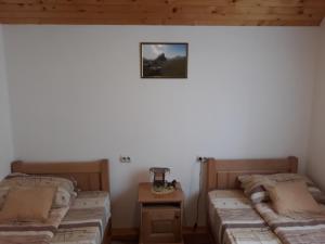 Voodi või voodid majutusasutuse Rooms Skorpijon toas