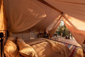 Posezení v ubytování Plage Cachée - Glamping