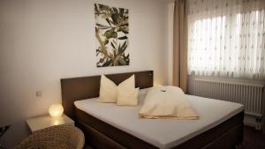 Säng eller sängar i ett rum på Fritz Hotel & Restaurant KG