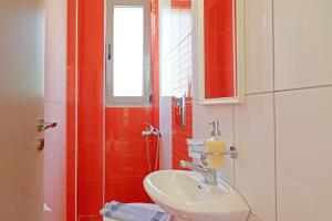 A bathroom at Evgoro Luxury Suites