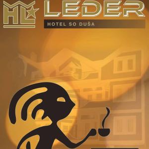 a poster of a person holding a cup of coffee at Hotel Leder in Kočani