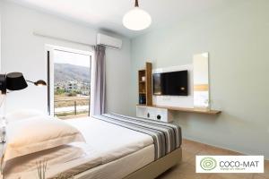 Llit o llits en una habitació de Ethereal Apartments Chania
