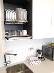 A kitchen or kitchenette at AD Home centro