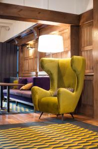 Posezení v ubytování Le Manoir Hôtel