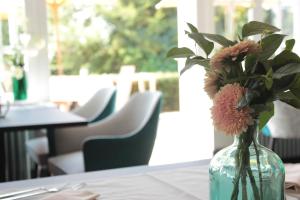 Posezení v ubytování Le Manoir Hôtel