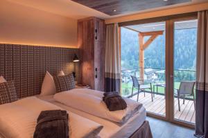 Posteľ alebo postele v izbe v ubytovaní Mountain Spa Residences